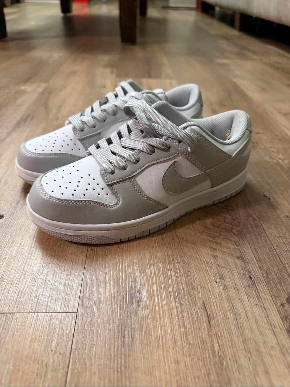 Nike Women's Low-Top Sneakers in Light Gray and White